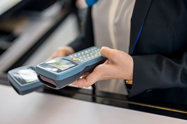 Woman Holding QR Code Scanners